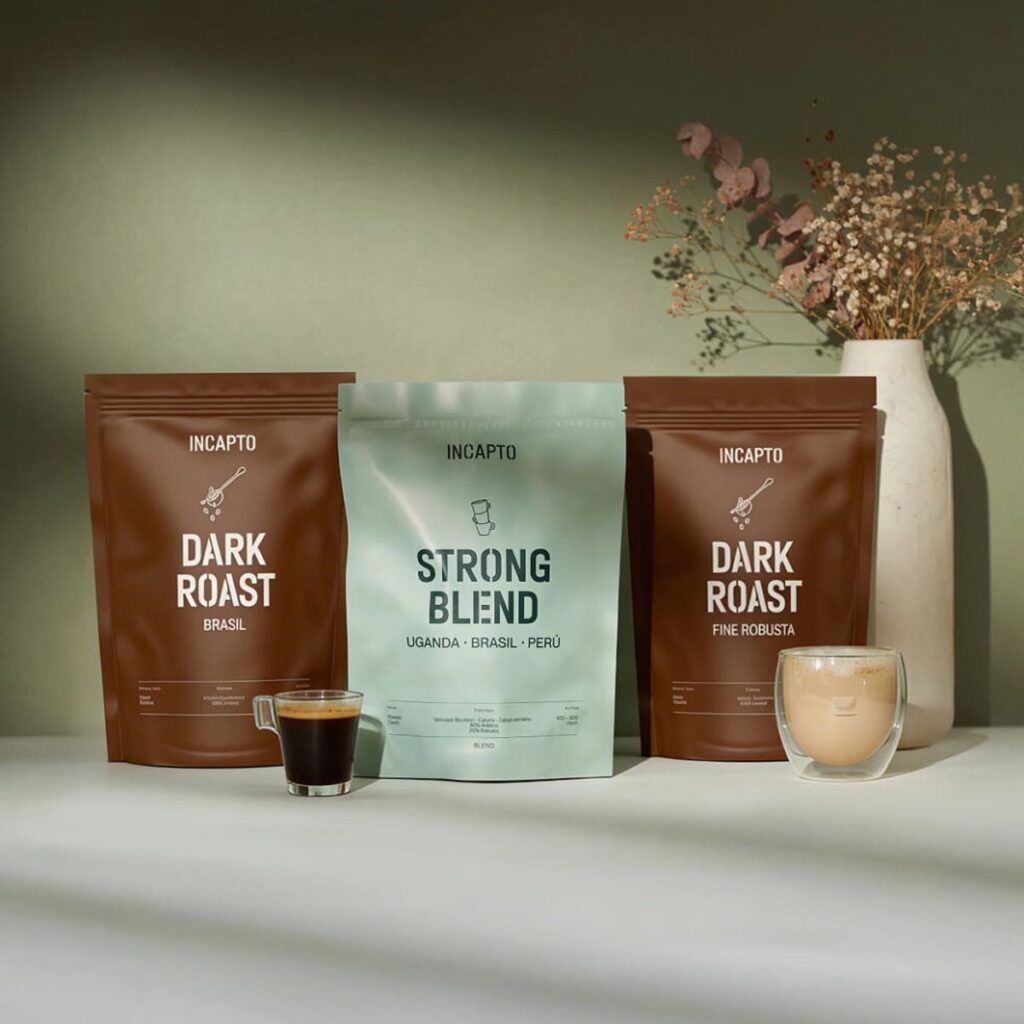 Abonnement café en grains Incapto avec gamme Dark Roast et Strong Blend accompagnée de tasses de café