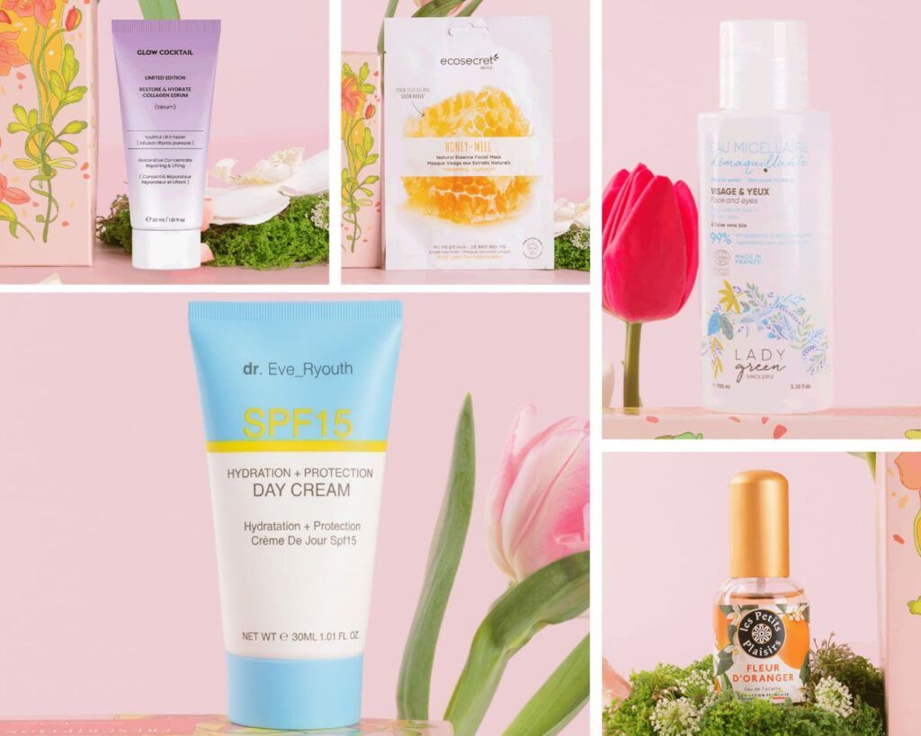 Collage de produits de beauté incluant crème SPF15 Dr. Eve Ryouth, masque au miel, sérum et eau micellaire sur fond rose