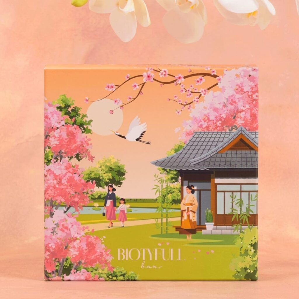 Design de la box Voyage en Corée avec fleurs de cerisier, jardin asiatique et maison traditionnelle