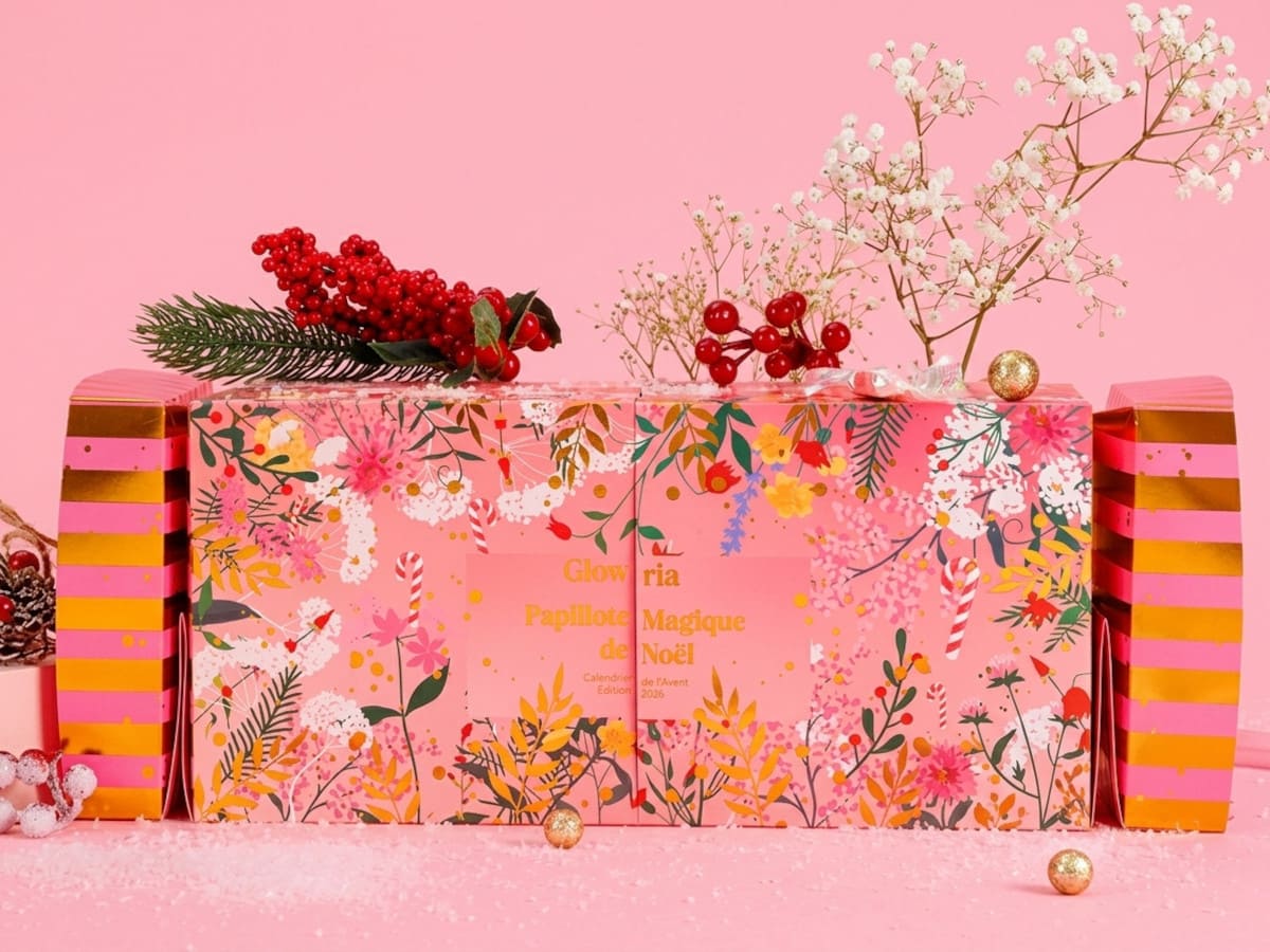 Design du calendrier de l’Avent La Papillote Magique de Noël, sur fond rose